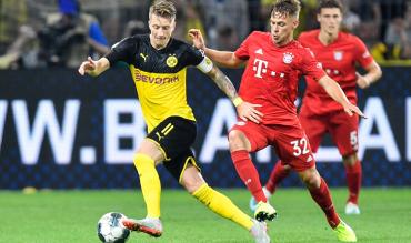 Reus und Kimmich sind Führungsspieler in der Nationalmannschaft. Am Wochende spielen sie gegeneinander.